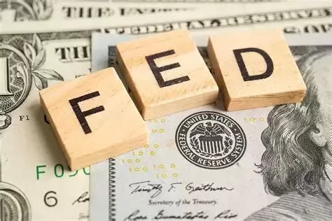 Fed Cuts Rates Amidst Internal Divide, Hints at Pause